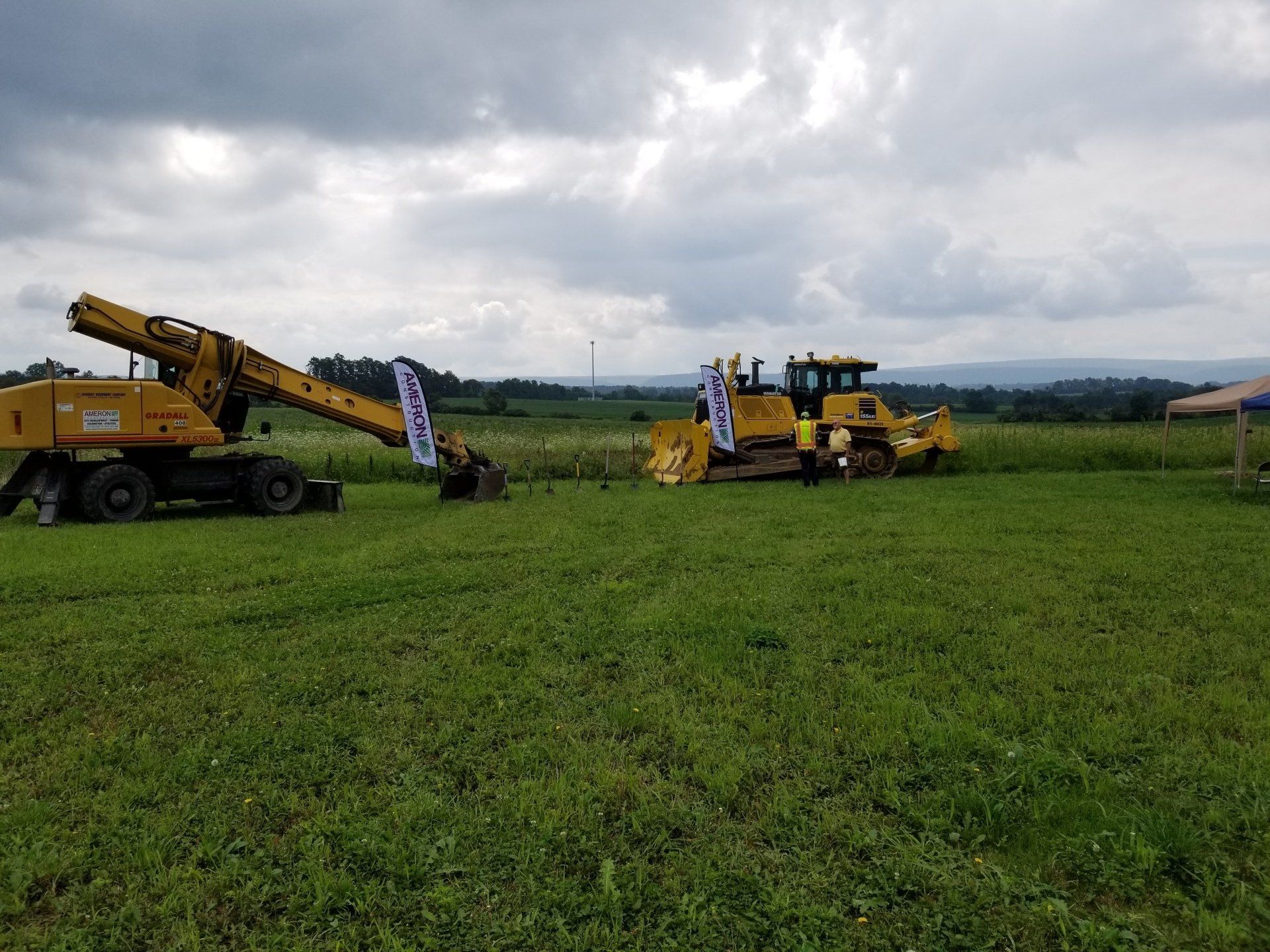 Excavator and backhoe on a site