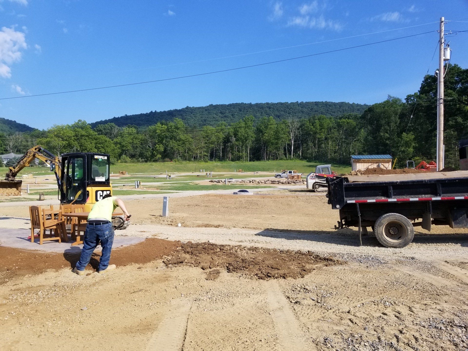 Ameron crew grading a job site with heavy equipment