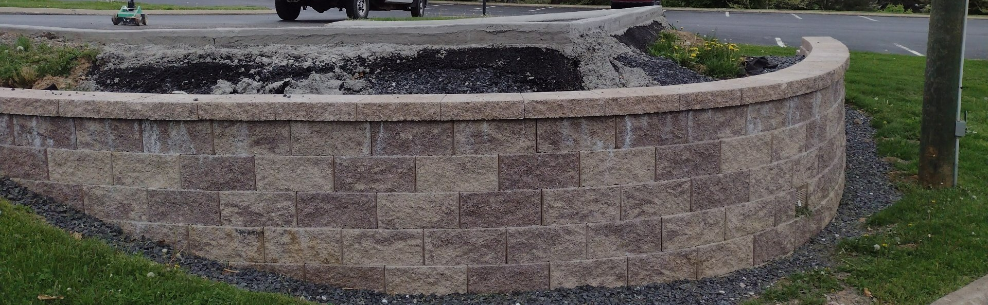 Curved stone seat wall